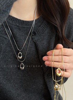 银色镂空水滴吊坠项链女高级感轻奢小众毛衣链钛钢不掉色长款配饰