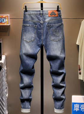 轻奢蓝色十字架九分牛仔裤男士修身小脚裤潮牌时尚压花韩版9分裤