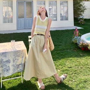甜美黄色无袖针织衫半身裙套装女夏2025新款独特漂亮两件套巨好看,披风样式的裙怎么搭配图片