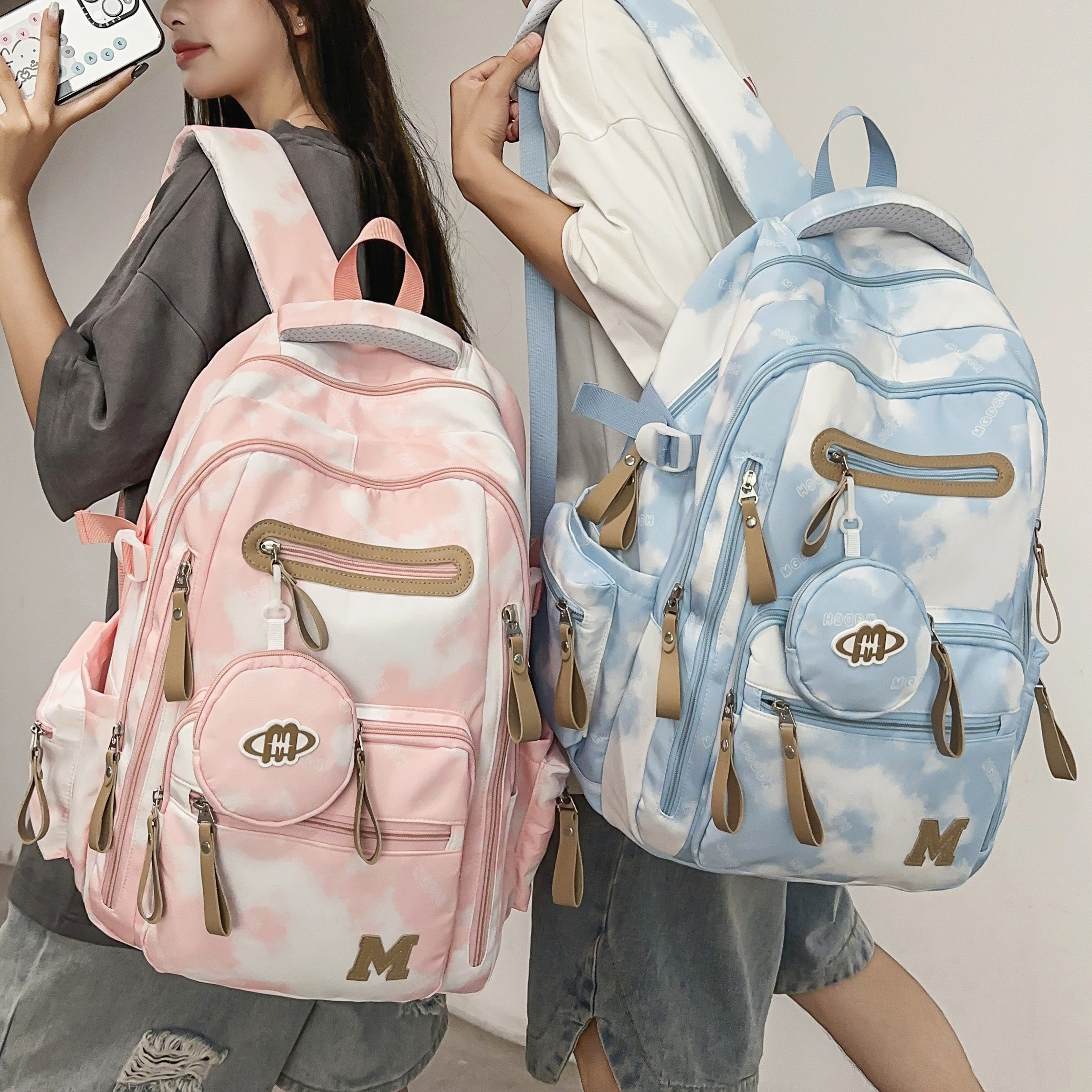 专柜正品高颜值书包女减负韩版扎染云朵印花双肩包初中高中大学生