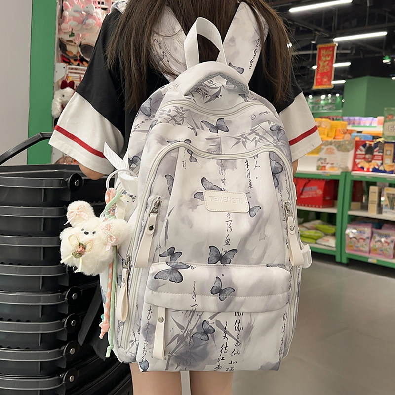 专柜正品初中女生双肩包日韩风大容量高颜值印花蝴蝶背包小学生书
