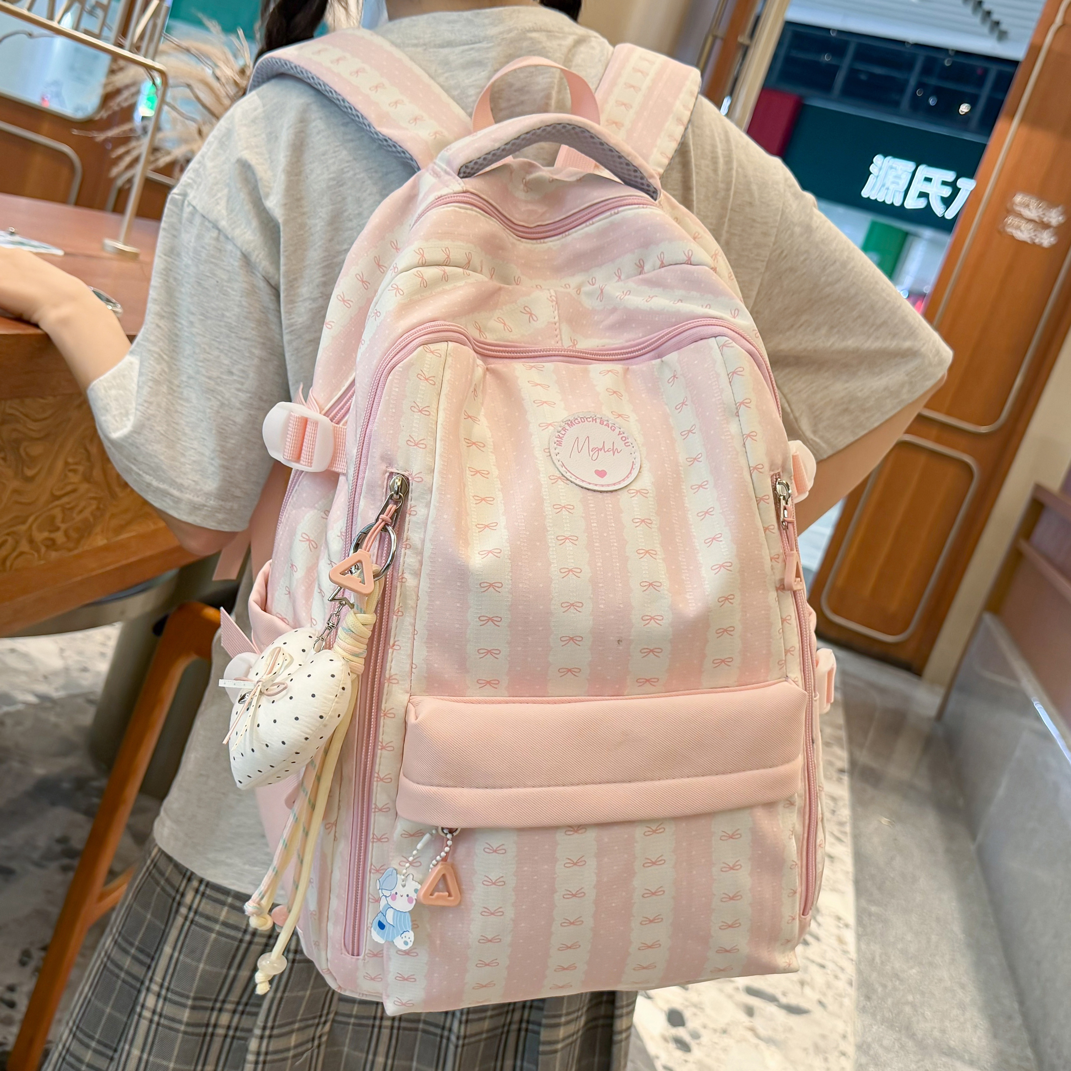 专柜正品书包女少女风初中高颜值条纹蝴蝶结双肩包女小学高中生轻