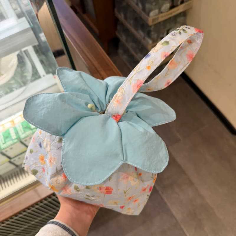 温柔浅蓝碎花花朵手提包清新文艺风抽绳便当包日常百搭手拎小包