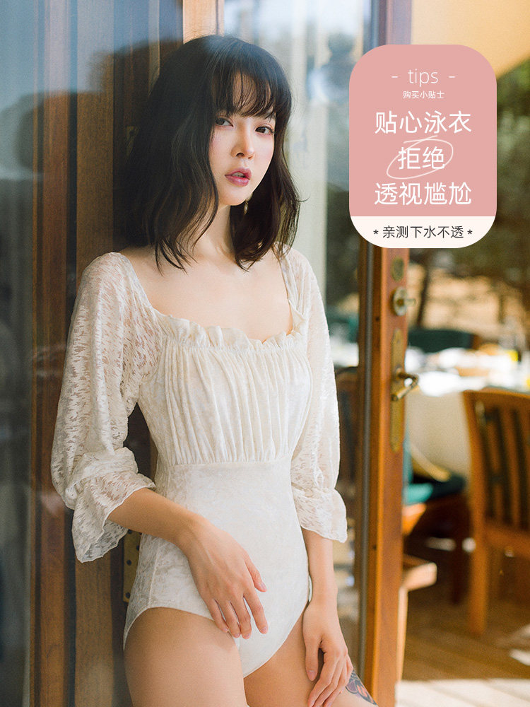 OMOM swimsuit women's one-piece triangle belly cover thin backless long-sleeved ins wind Sanya bath suit vacation students