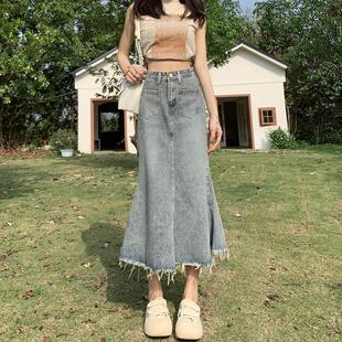 2025年牛仔半身裙鱼尾裙女新款a字毛边复古中长款高腰荷叶裙