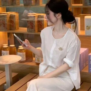 春夏女装2026新款通勤穿搭法式茶里茶气别致白色上衣重要场合小衫