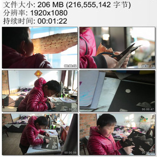 鱼皮做手工画寄托对家 东北农村赫哲族男孩用晒干 实拍视频素材