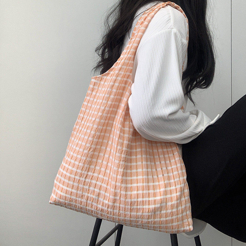 新的款镂空格子大容量帆布单肩包女薄款风小清新学生书包仙女