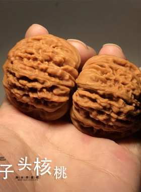 勇麒麟纹大官帽四座楼狮子头原色精配对高抛好料文玩核桃手把件