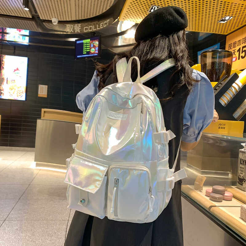 2024新款轻便防水书包女镭射大容量旅行旅游双肩包时尚背包