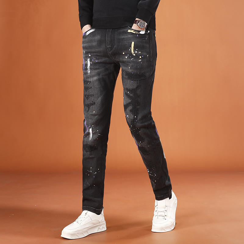 泼墨印花破洞男士牛仔裤秋冬款