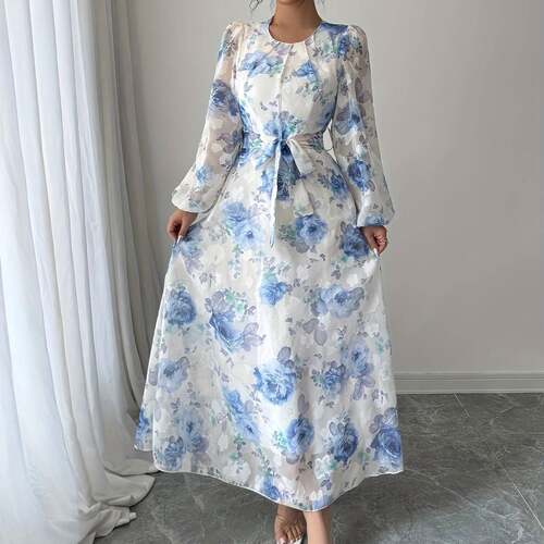A women's white and blue  Long sleeve floral print waist