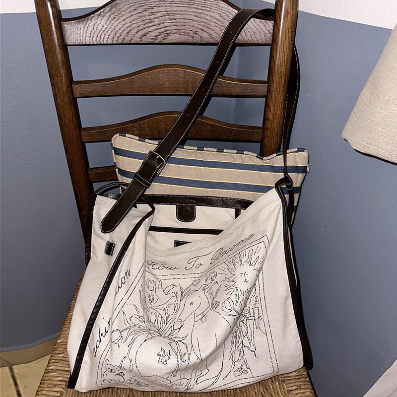 2026春季新款文艺印花帆布包手提包老钱风高级感单肩包帆布袋女包