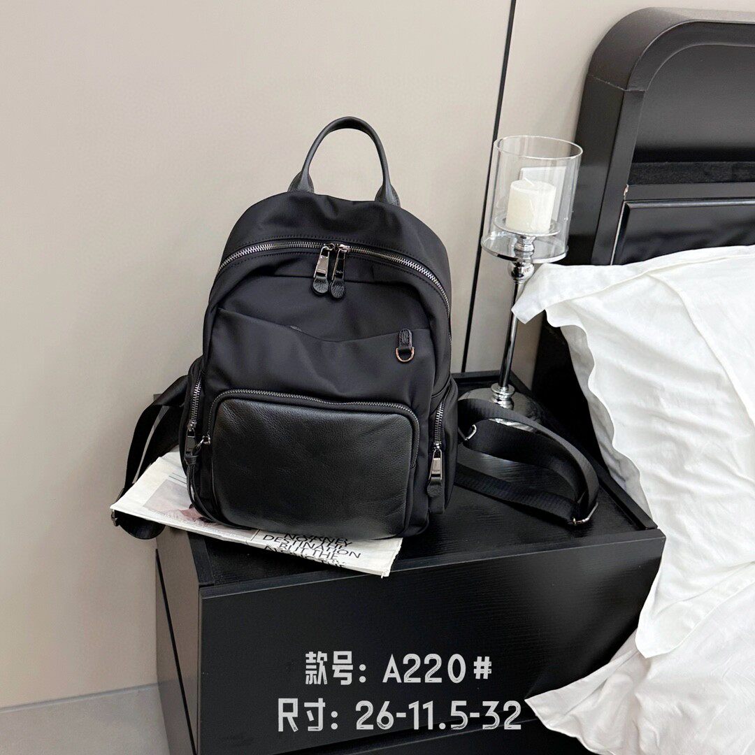 小红书推荐双肩背包2025新款高级感牛皮双肩包休闲防水尼龙牛津布