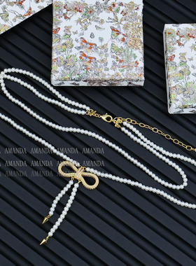 双层蝴蝶结珍珠项链毛衣链女