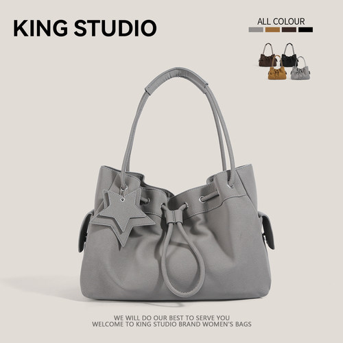 小众荔枝纹抽绳云朵包女单肩包