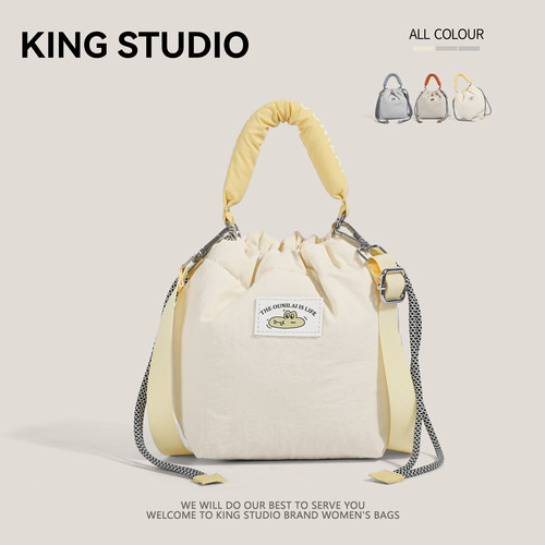 日系文艺单肩微单相机包水桶包