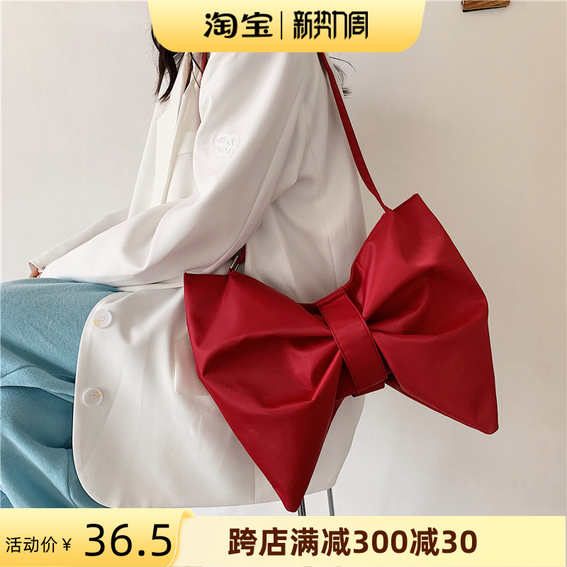 原创小众个性蝴蝶结托特包大容量斜挎包单肩布包女帆布包气质学生
