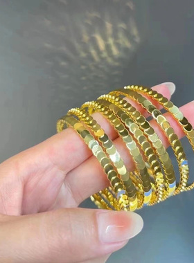 2023年新款网红鱼鳞片波光粼粼手镯女钛钢镀18K金不掉色波浪手镯