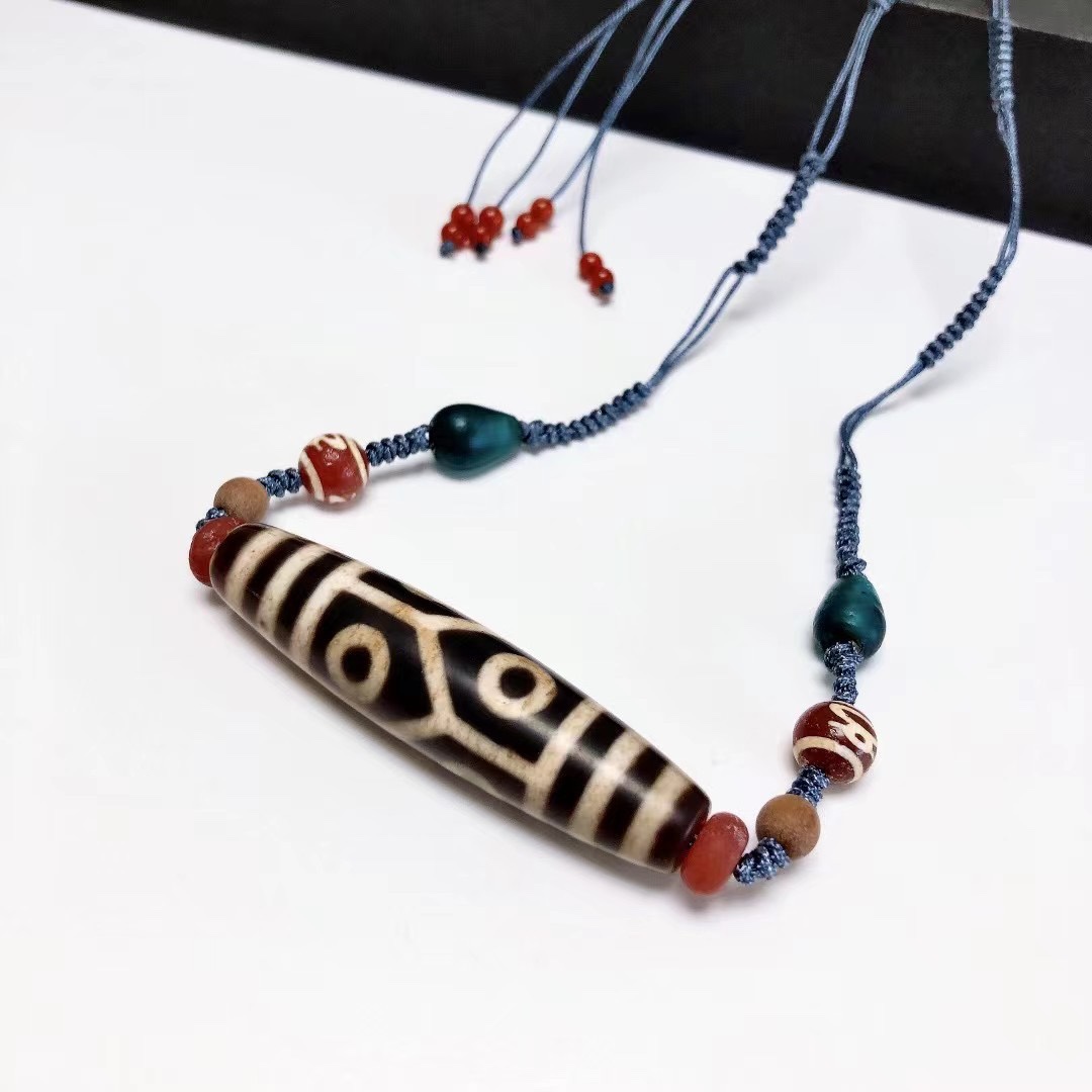 D881# 西藏老料至纯六眼包浆天珠玉化老玛瑙吊坠57*13mm