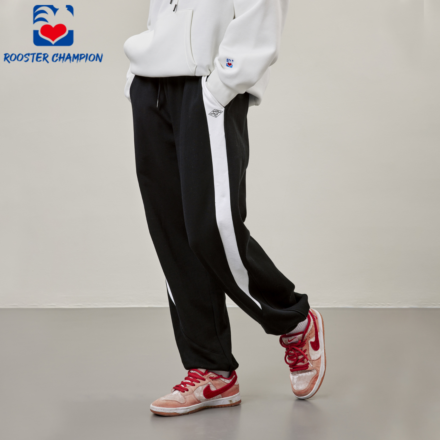 公鸡冠军黑色拼接束脚卫裤