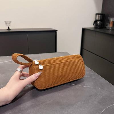 2026 small make-up bag with about a fuzzy pen bag and a box
