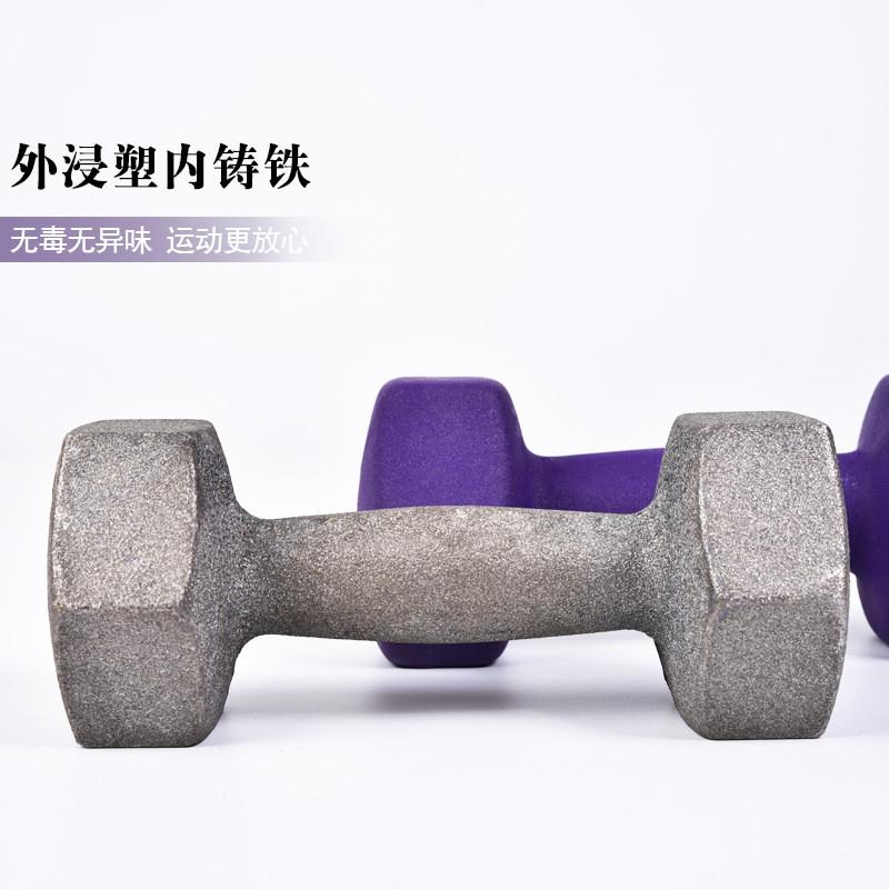 Wrestling with little dumb-bell Ms. Yogas gym equipment.