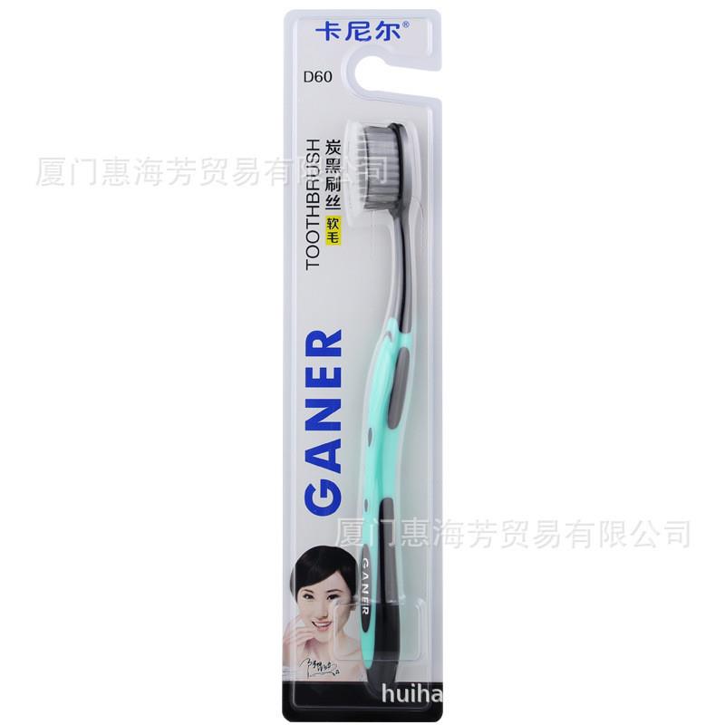 A60-year-old mans carbon-black toothbrush.