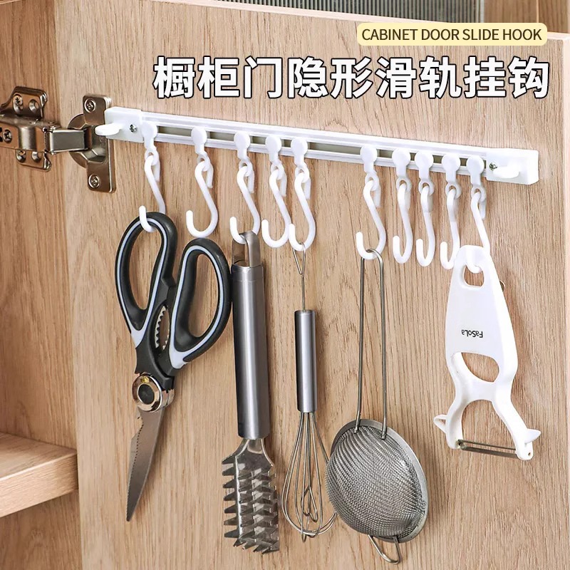 Behind-the-cabinet-door sliding track hooks a row of no-dr