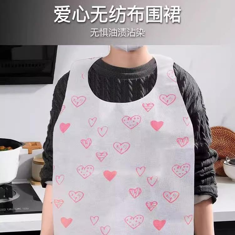 Disposable non-woven apron with a heart-shaped breathable pr