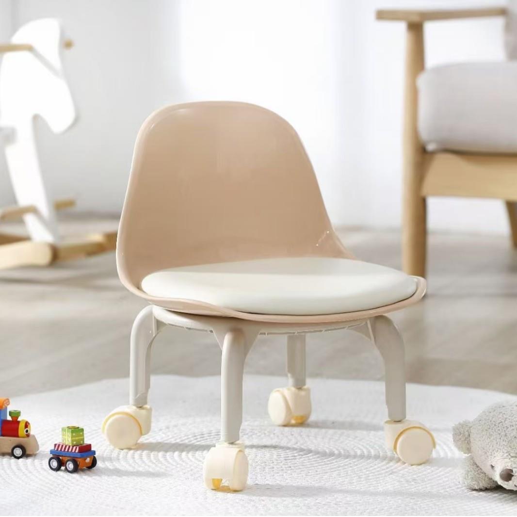 Trendy small stool with swivel casters, a low seat perfect f