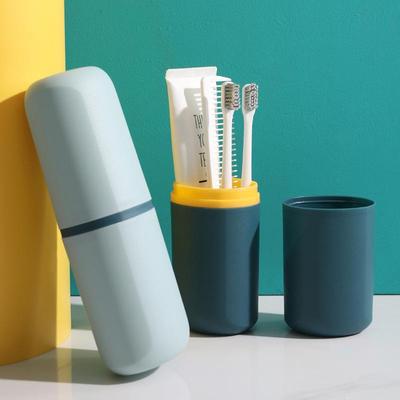 A minimalist home travel set including a rinsing cup, toothb