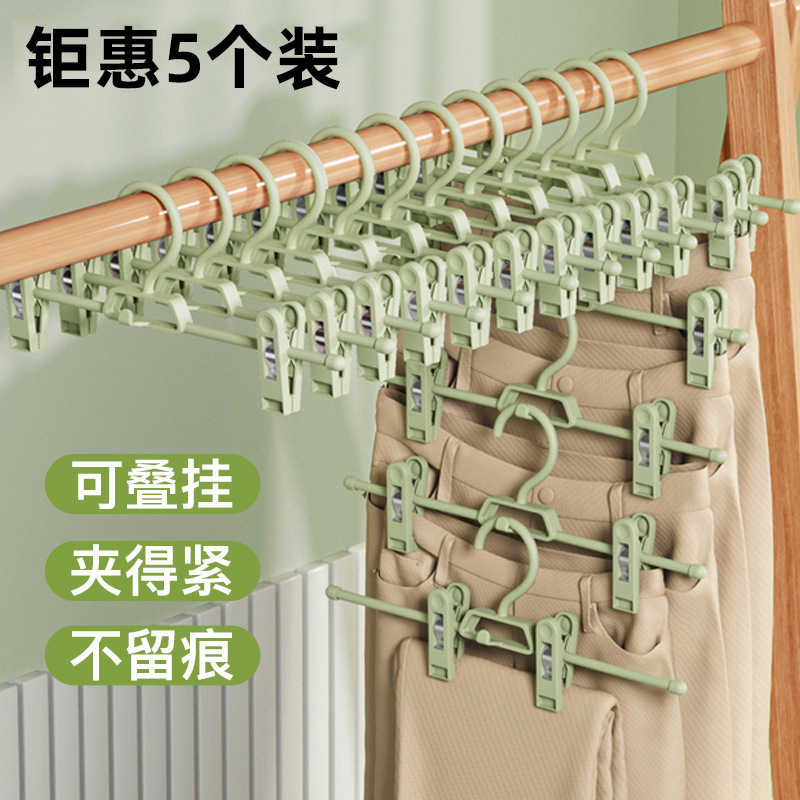 A set of 5 non-slip pants hangers with clips for home use de