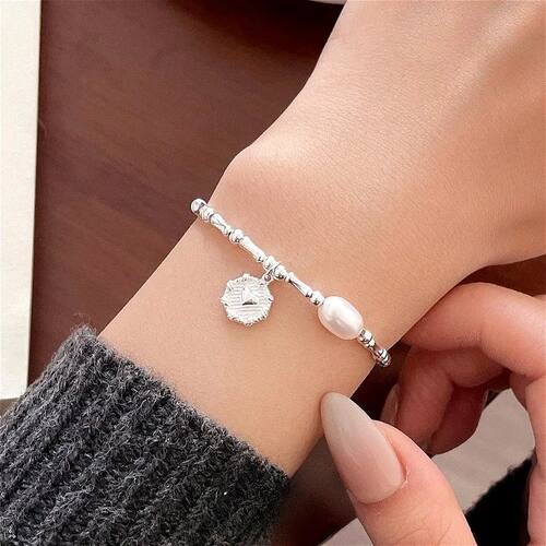 Sterling Silver Bracelet with Genuine Pearls and Elegant Kno