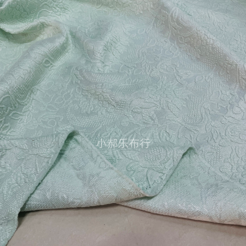 浅绿色肌理提花羊毛呢布料西服套装半身裙夹克设计师定制服装面料