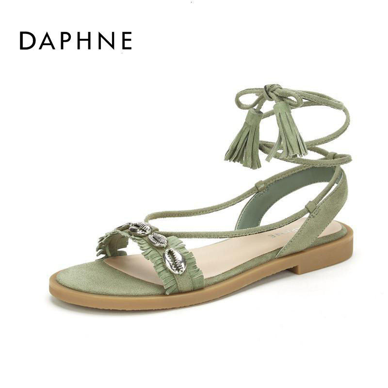 daphne/达芙妮正品夏女鞋时尚环脚绑带流苏绒面低跟罗马风女凉鞋