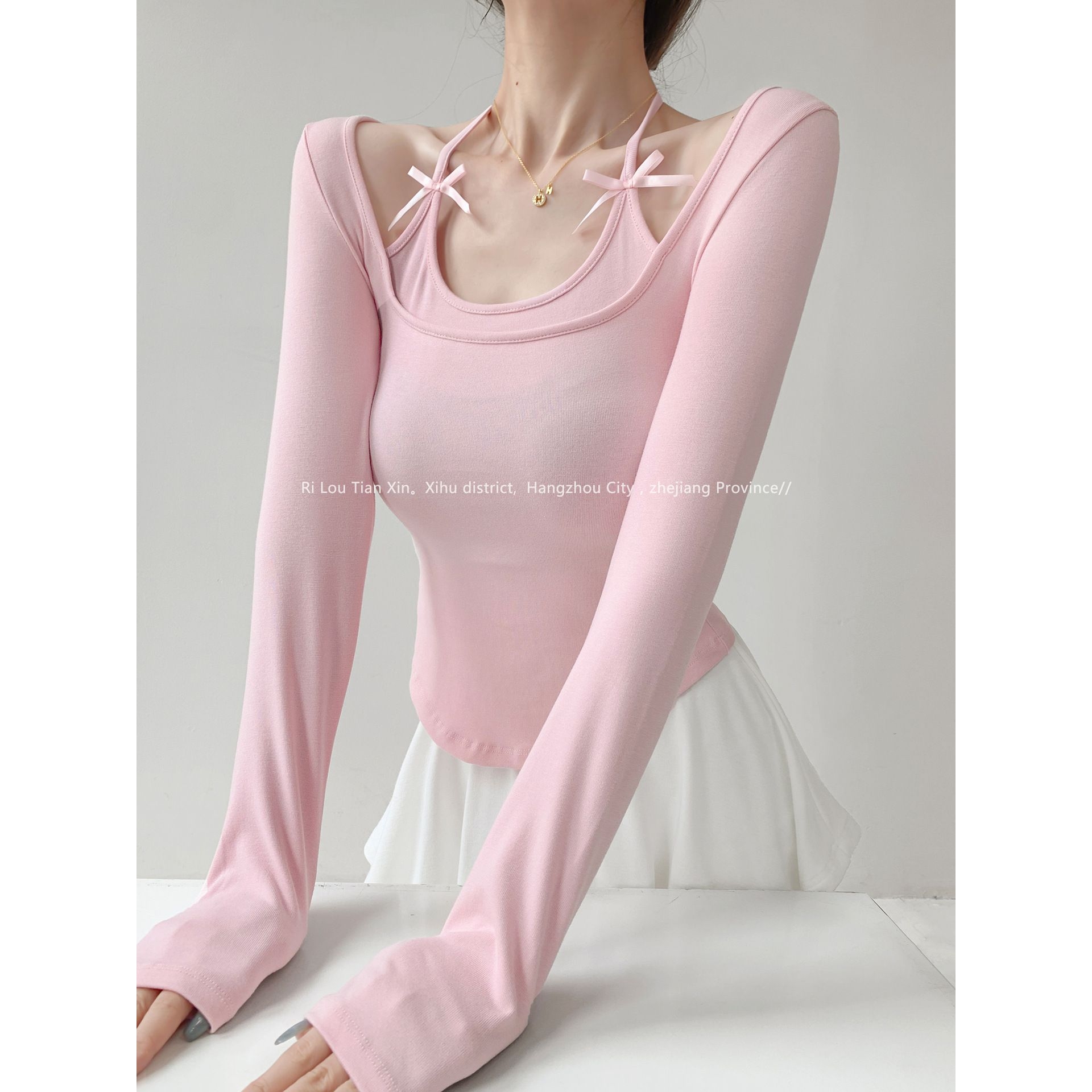 甜欲人间系带挂脖假两件长袖T恤女秋纯欲蝴蝶结弧边下摆短款上衣