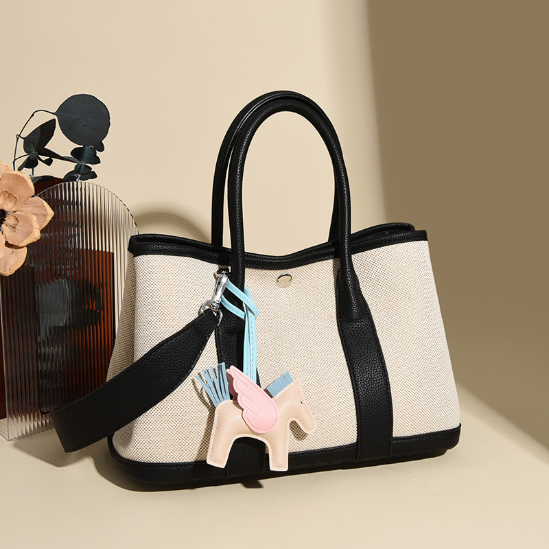 新款水桶包高级感包包女小众挂饰花园包大容量质感单肩包