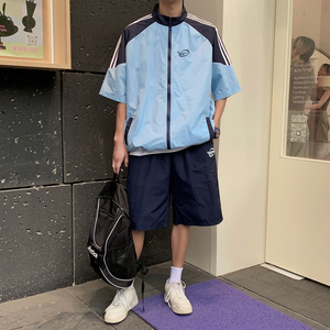 B318-S422-P60    夏季男士情侣休闲立领运动学生短袖套装图片