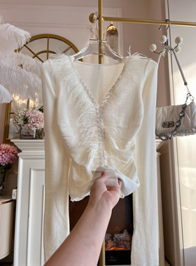 2025年韩国设计感重工镶钻羽毛针织衫女气质修身百搭打底衫上衣春