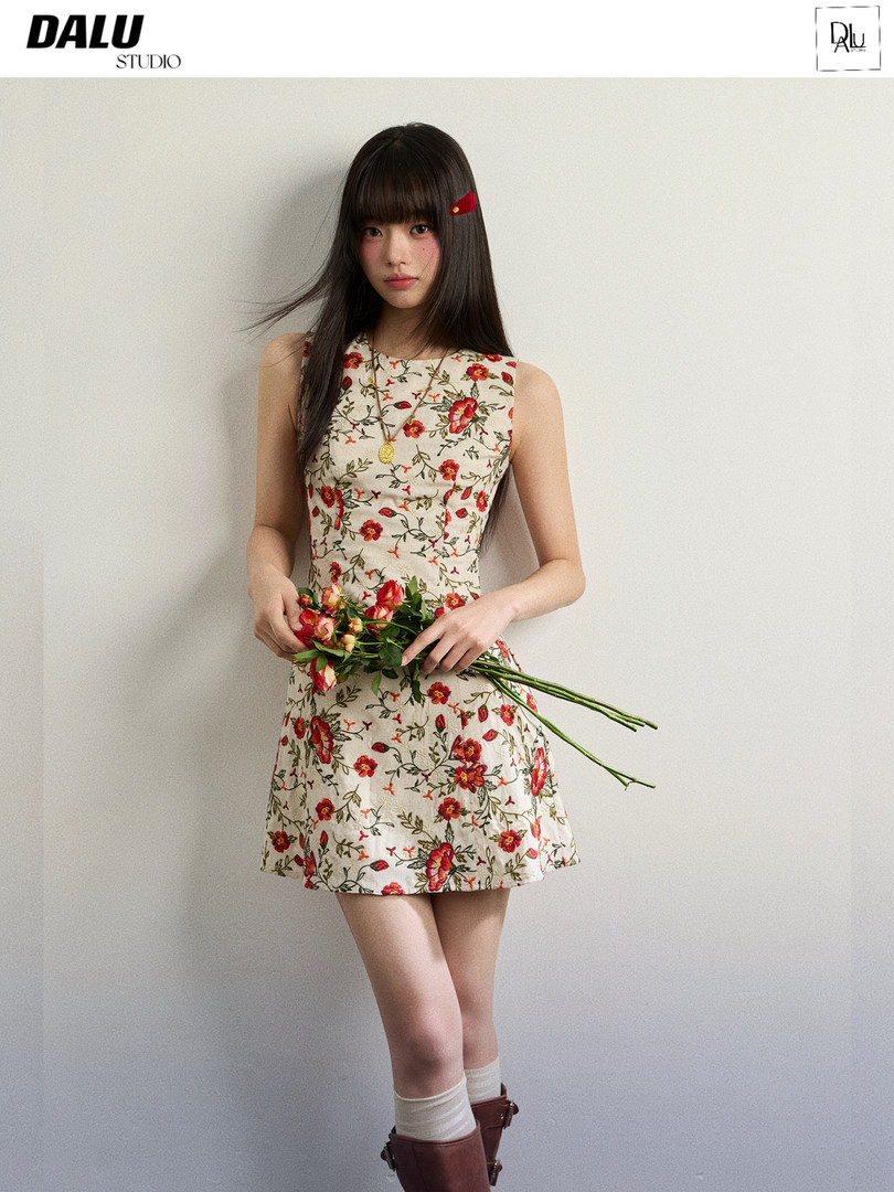 Floral sleeveless mini dress worn by a model
