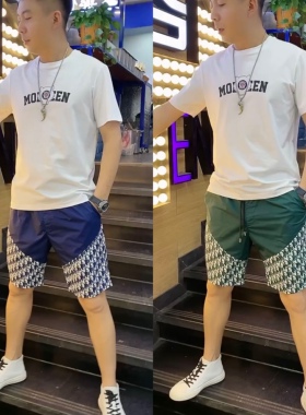 66110夏季男士时尚撞色拼接撞色短裤男外传欧货印花五分裤沙滩裤