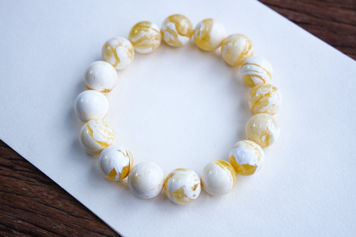 琥珀蜜蜡 俄料金瓷白圆珠手串 12.2mm 重:15.47克