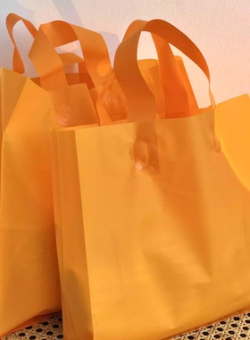 塑料袋包装袋黄橙色PE塑料手提袋服装包装礼品袋桔色义乌市购物袋