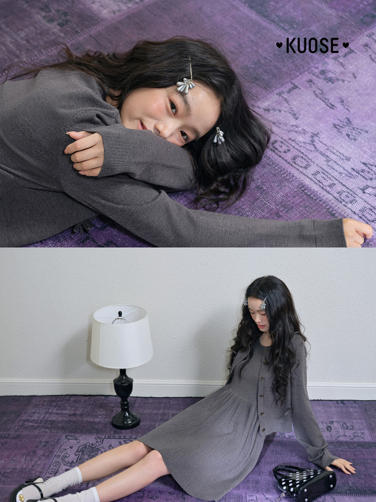 Gray long-sleeve button-front knit dress worn by a model