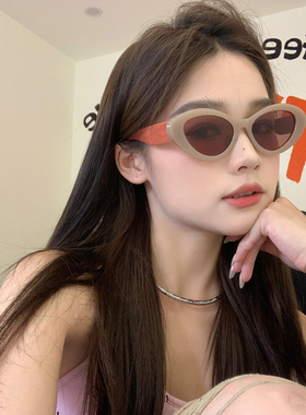 茶色猫眼椭圆墨镜显脸瘦凹造型