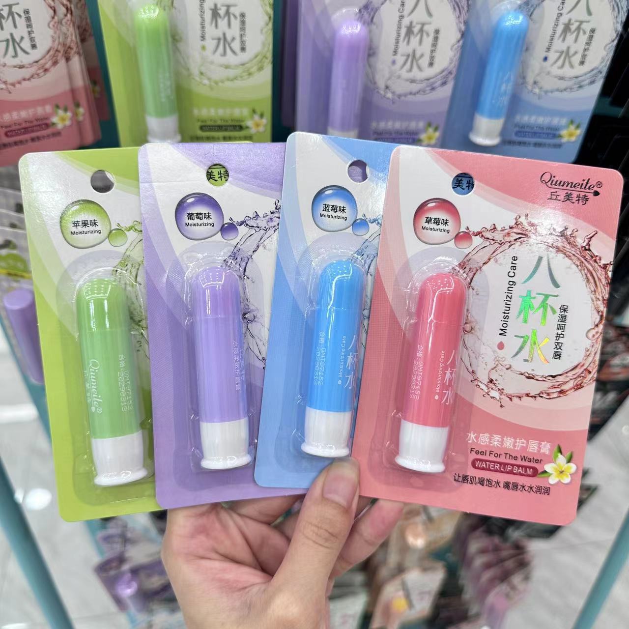 2024年女士润唇膏丘美特八杯水芦荟滋润保湿纸卡卡通润唇膏