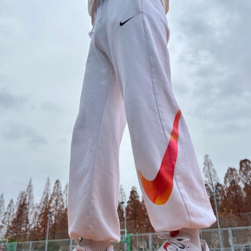 Nike耐克女运动宽松大勾针织长裤
