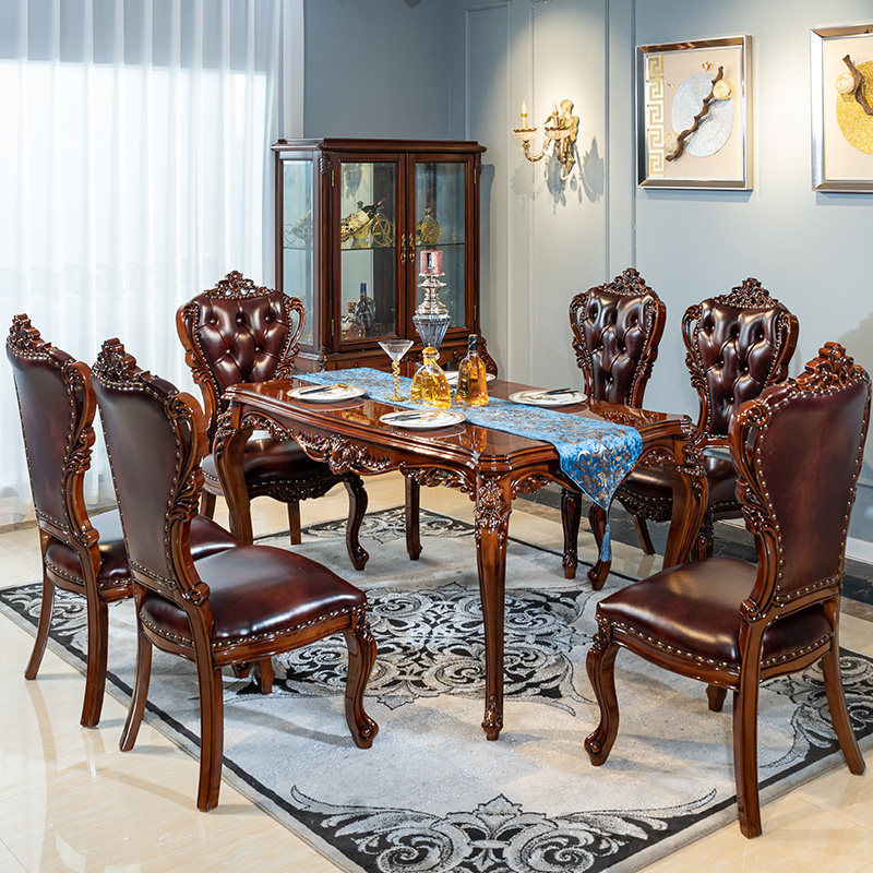 欧式实木餐桌椅组合美式雕花奢华烤漆深色头层牛皮家用长方形桌子
