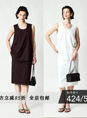 双层叠穿背心+时髦铅笔及膝半裙